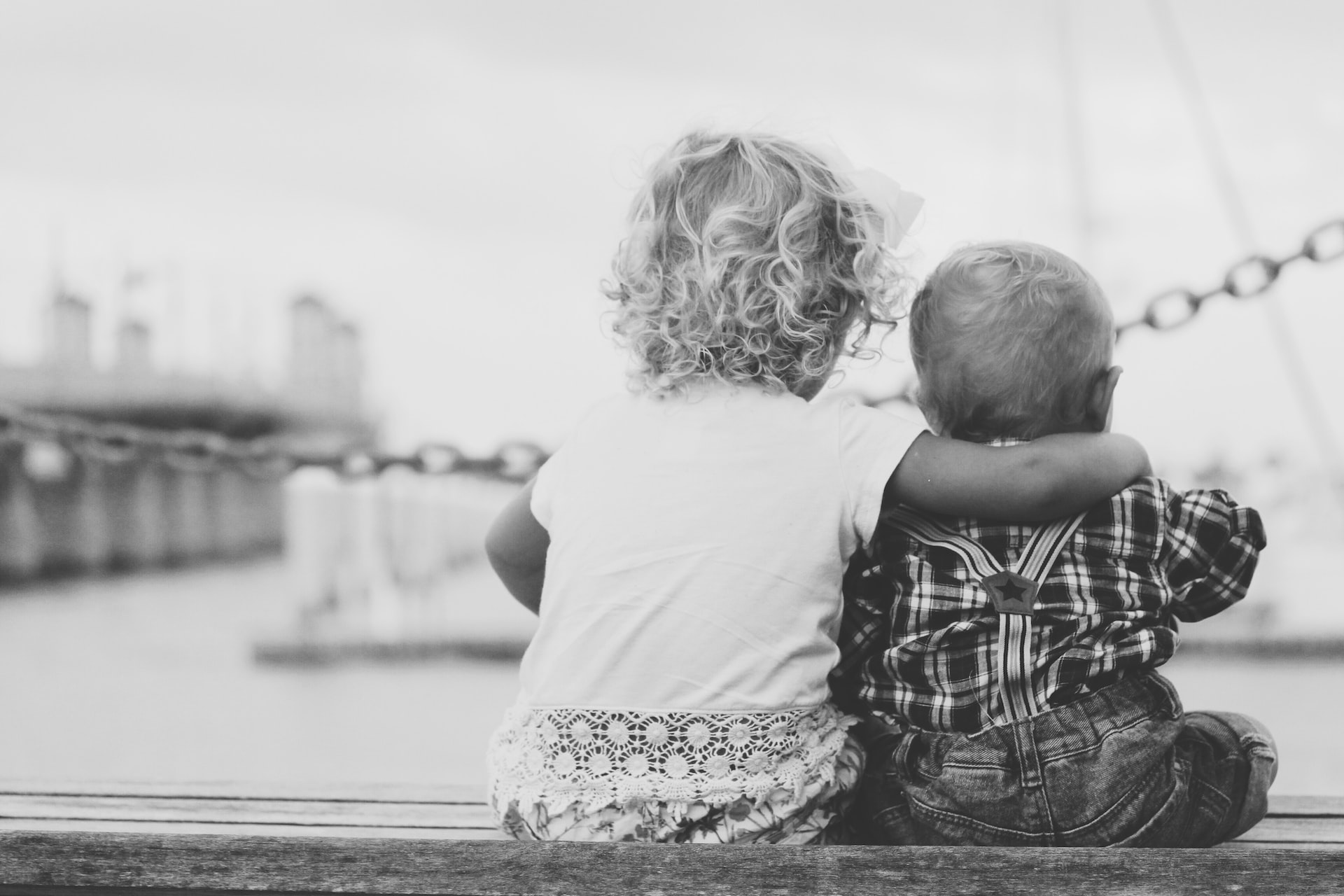 siblings facing away